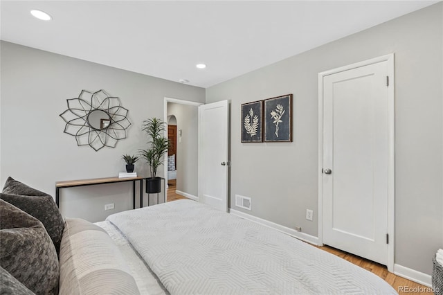 bedroom featuring light hardwood / wood-style flooring