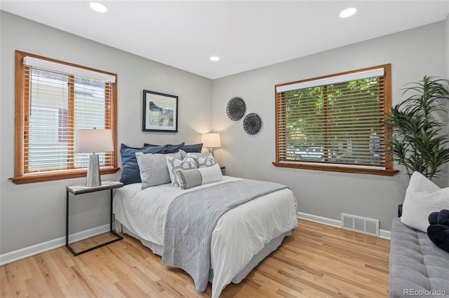 bedroom featuring light wood-type flooring