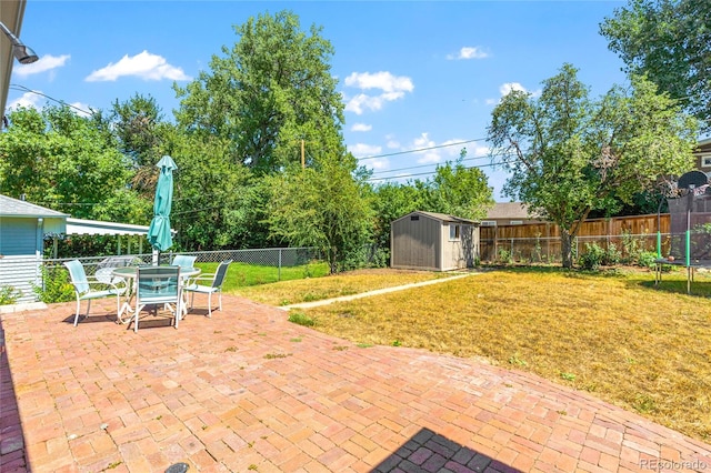 view of patio with a shed and a trampoline