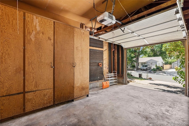 garage featuring a garage door opener