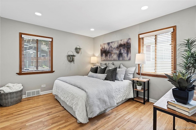 bedroom featuring light wood-type flooring