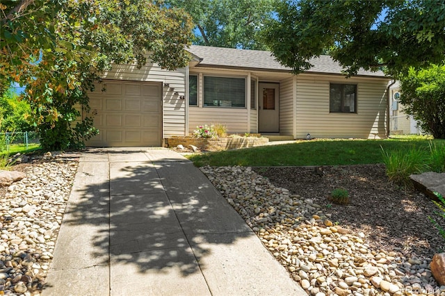 single story home featuring a garage