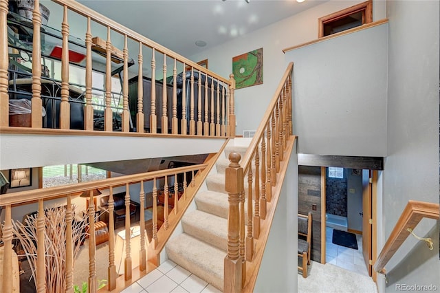7261 S Colorado Ct, Centennial, CO 80122 - staircase featuring tile patterned flooring