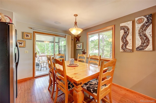 7261 S Colorado Ct, Centennial, CO 80122 - dining space with healthy amount of natural light and light wood-style flooring