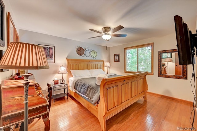 7261 S Colorado Ct, Centennial, CO 80122 - bedroom with light wood-type flooring and a ceiling fan