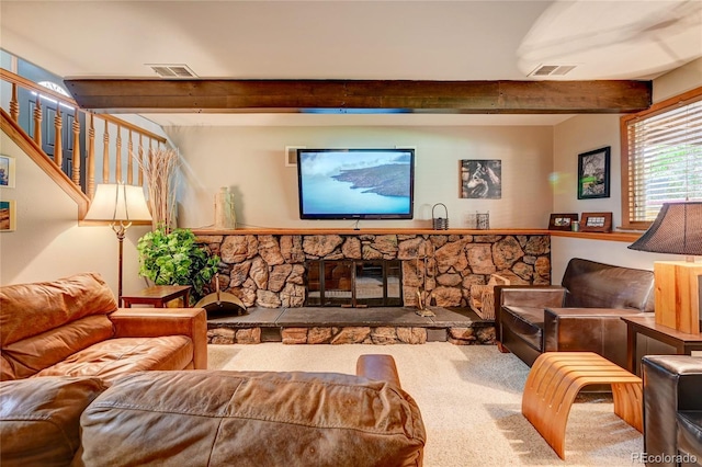 7261 S Colorado Ct, Centennial, CO 80122 - carpeted living room featuring beam ceiling and a fireplace