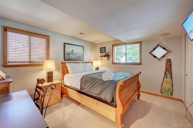 7261 S Colorado Ct, Centennial, CO 80122 - carpeted bedroom featuring baseboards