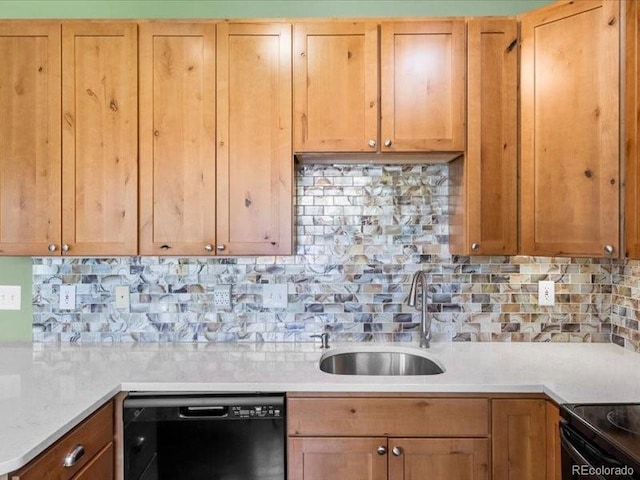 10000 Ryan Gulch Rd Unit 116, Silverthorne, CO 80498 - kitchen with black appliances, light countertops, and backsplash