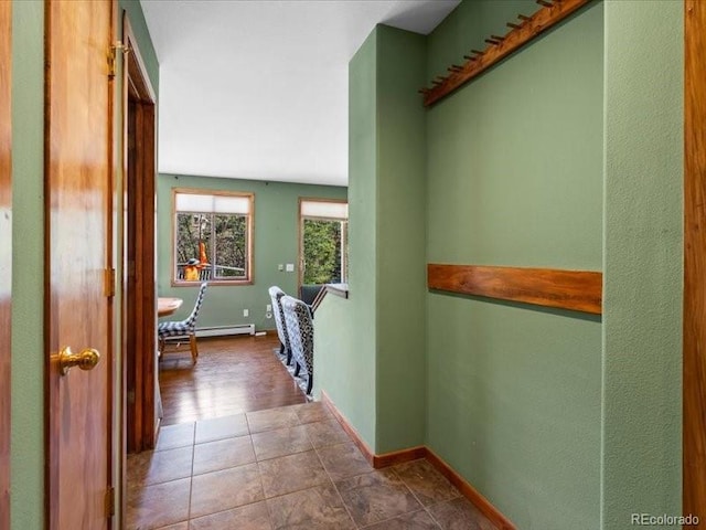 10000 Ryan Gulch Rd Unit 116, Silverthorne, CO 80498 - hallway with a baseboard heating unit and baseboards