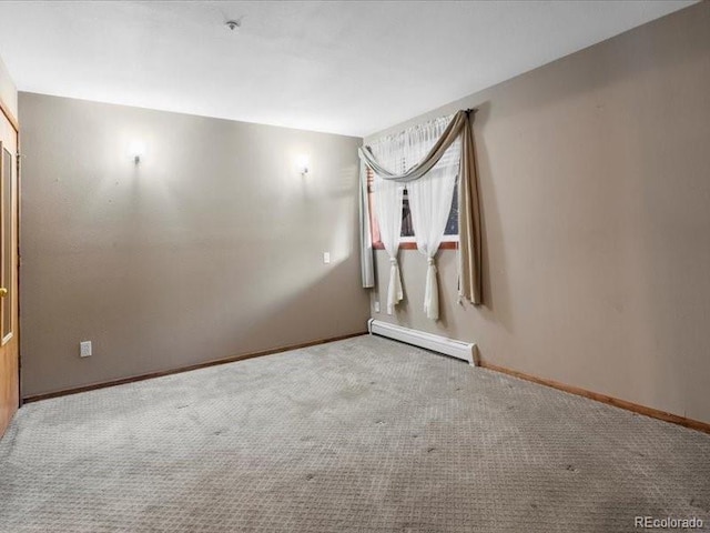 10000 Ryan Gulch Rd Unit 116, Silverthorne, CO 80498 - carpeted spare room with baseboard heating and baseboards