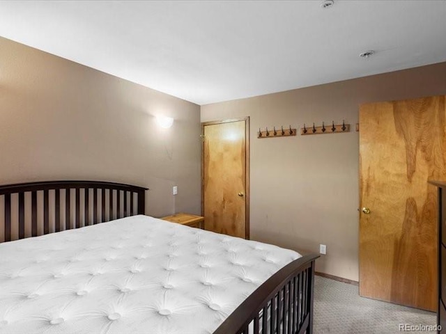 10000 Ryan Gulch Rd Unit 116, Silverthorne, CO 80498 - bedroom featuring light colored carpet and baseboards
