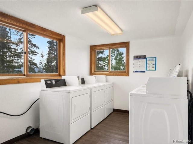 10000 Ryan Gulch Rd Unit 116, Silverthorne, CO 80498 - communal laundry room featuring washer and clothes dryer and dark wood-style flooring