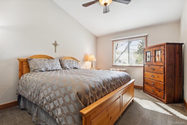 bedroom featuring lofted ceiling, ceiling fan, and carpet flooring