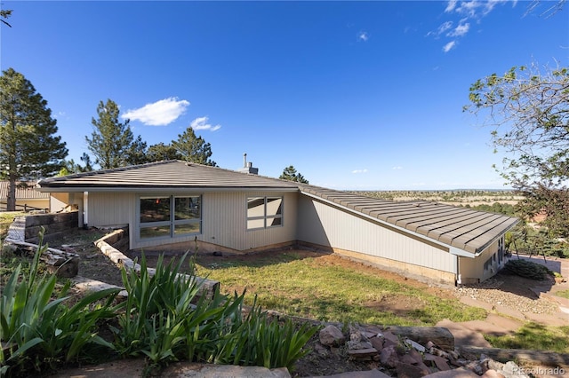 11039 Roxborough Dr, Littleton, CO 80125 - view of side of home featuring a tiled roof