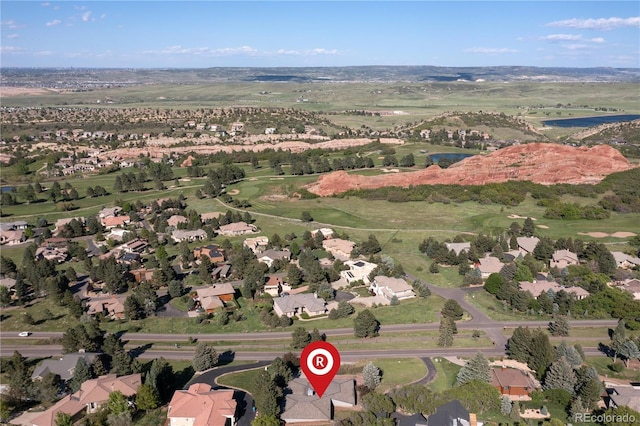11039 Roxborough Dr, Littleton, CO 80125 - aerial view of property and surrounding area featuring a nearby body of water, nearby suburban area, and a local golf course