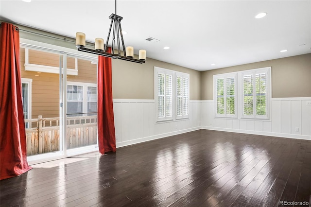 3450 Valentia St, Denver, CO 80238 - unfurnished dining area featuring wainscoting, hardwood / wood-style floors, and recessed lighting