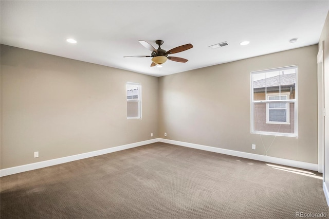 3450 Valentia St, Denver, CO 80238 - empty room with a ceiling fan, plenty of natural light, carpet, and recessed lighting