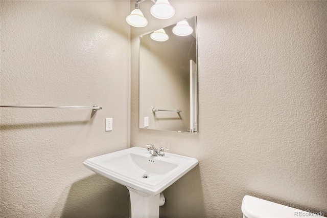 3450 Valentia St, Denver, CO 80238 - bathroom with toilet and a sink