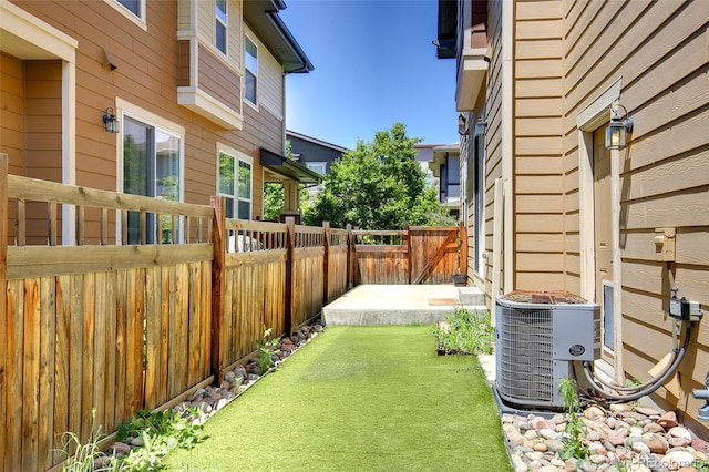3450 Valentia St, Denver, CO 80238 - fenced yard with cooling unit