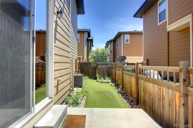 3450 Valentia St, Denver, CO 80238 - fenced backyard with central AC unit and a patio area