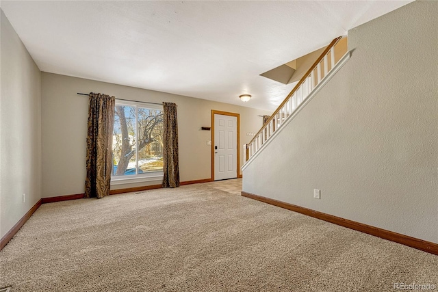 unfurnished room with carpet