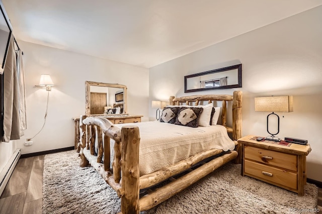 325 Four O Clock Rd Unit 303, Breckenridge, CO 80424 - bedroom featuring baseboard heating and baseboards
