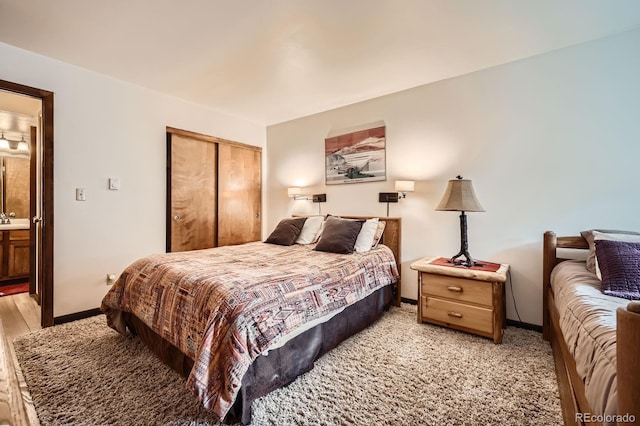 325 Four O Clock Rd Unit 303, Breckenridge, CO 80424 - bedroom with a closet and baseboards