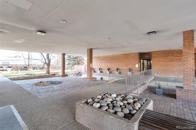 1850 Folsom St Unit 411, Boulder, CO 80302 - view of patio / terrace featuring an outdoor fire pit