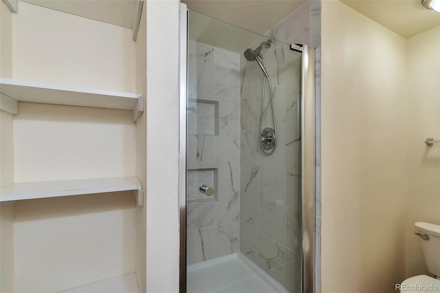 1850 Folsom St Unit 411, Boulder, CO 80302 - full bathroom featuring a shower stall and toilet