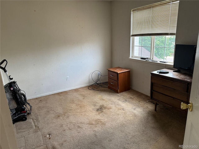 14874 E 52nd Ave, Denver, CO 80239 - unfurnished bedroom with light colored carpet and baseboards