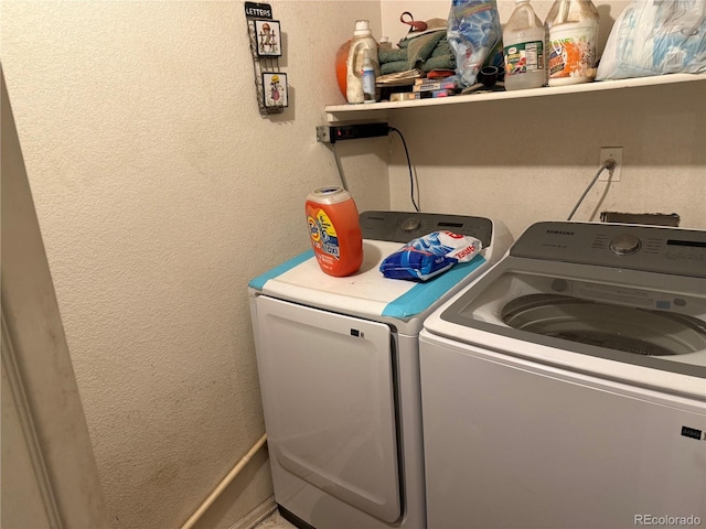 14874 E 52nd Ave, Denver, CO 80239 - laundry room featuring washer and dryer and a textured wall