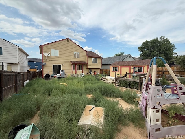 14874 E 52nd Ave, Denver, CO 80239 - back of house featuring a fenced backyard