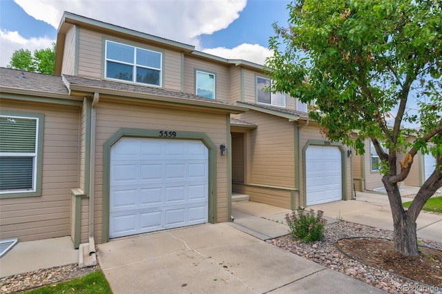 view of front of property with a garage