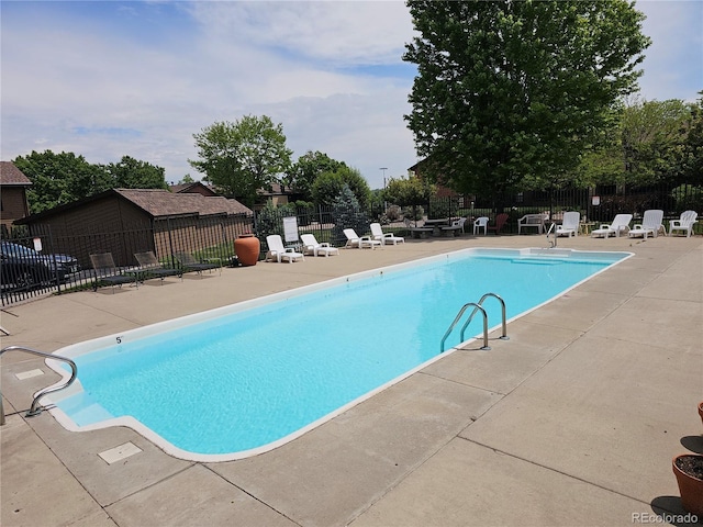 7000 W 20th Ave Unit 106, Lakewood, CO 80214 - community pool featuring a patio area