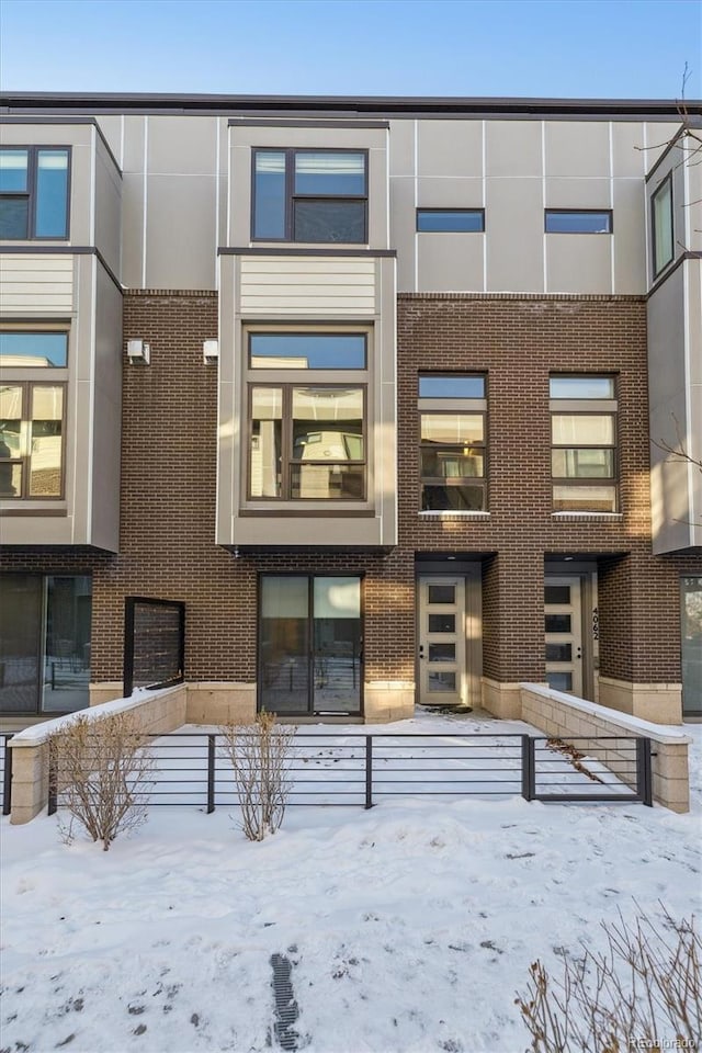 view of snow covered building