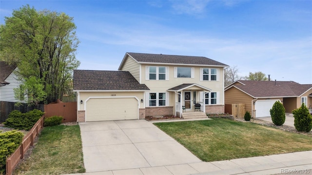 1055 Lindstrom Dr, Colorado Springs, CO 80911 - view of front of property with an attached garage, concrete driveway, and brick siding