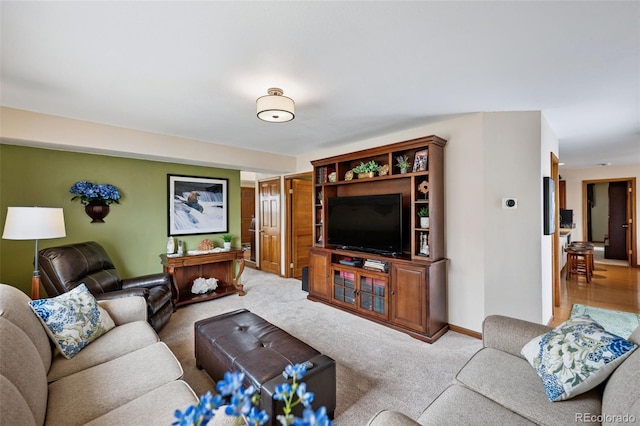 1055 Lindstrom Dr, Colorado Springs, CO 80911 - living area featuring carpet floors and baseboards