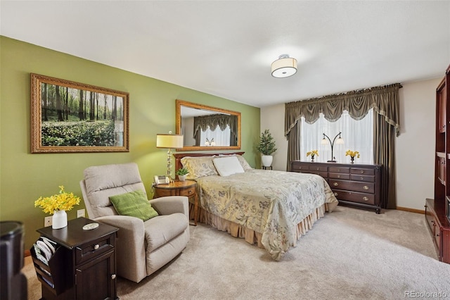 1055 Lindstrom Dr, Colorado Springs, CO 80911 - bedroom with light carpet