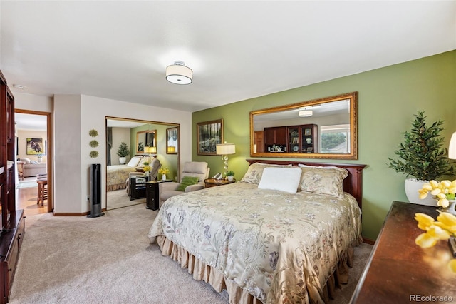 1055 Lindstrom Dr, Colorado Springs, CO 80911 - bedroom with light carpet, a closet, and baseboards