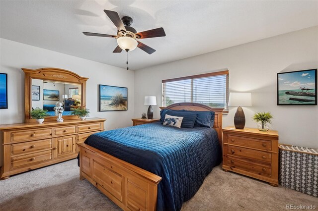 1055 Lindstrom Dr, Colorado Springs, CO 80911 - bedroom featuring light colored carpet and ceiling fan