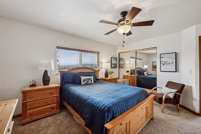 1055 Lindstrom Dr, Colorado Springs, CO 80911 - carpeted bedroom with a closet, baseboards, and ceiling fan