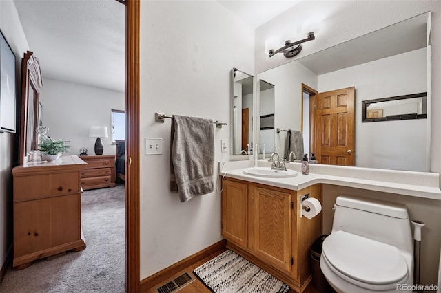 1055 Lindstrom Dr, Colorado Springs, CO 80911 - bathroom with vanity and toilet