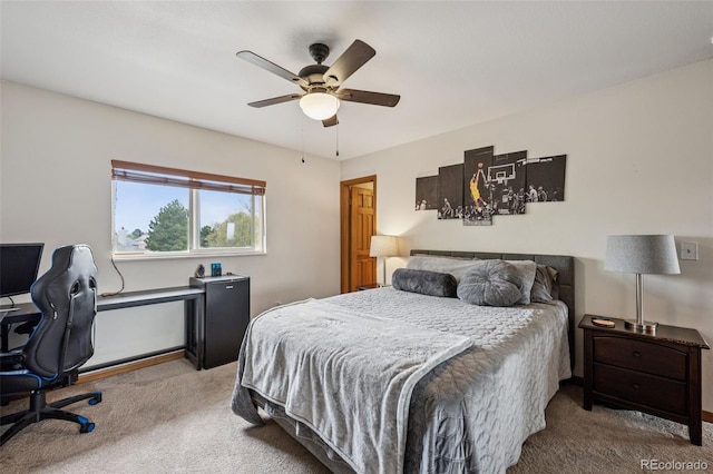 1055 Lindstrom Dr, Colorado Springs, CO 80911 - carpeted bedroom with an office area and ceiling fan