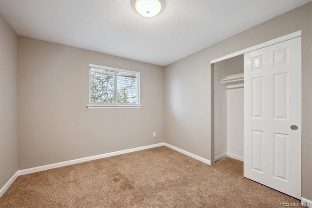 3685 Lewis St, Wheat Ridge, CO 80033 - unfurnished bedroom with carpet flooring, a closet, and baseboards