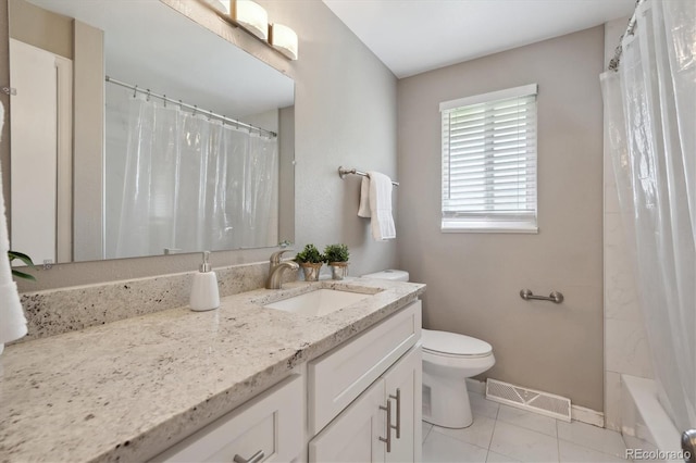 3685 Lewis St, Wheat Ridge, CO 80033 - full bathroom featuring toilet, tile patterned flooring, vanity, and baseboards