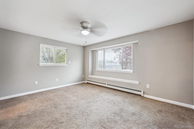 3685 Lewis St, Wheat Ridge, CO 80033 - spare room with a baseboard radiator, ceiling fan, carpet, and baseboards