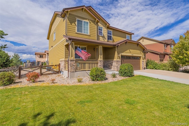 craftsman-style home featuring a front lawn and covered porch