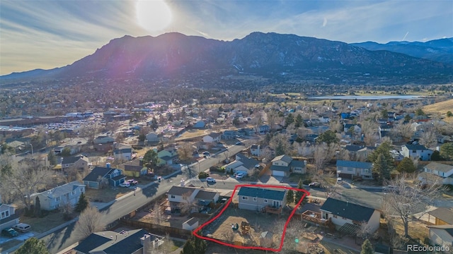 drone / aerial view featuring a mountain view