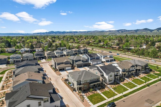 aerial view of residential area with a mountain backdrop
