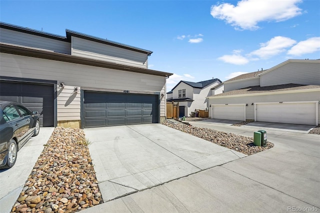 view of front of house featuring driveway and a garage